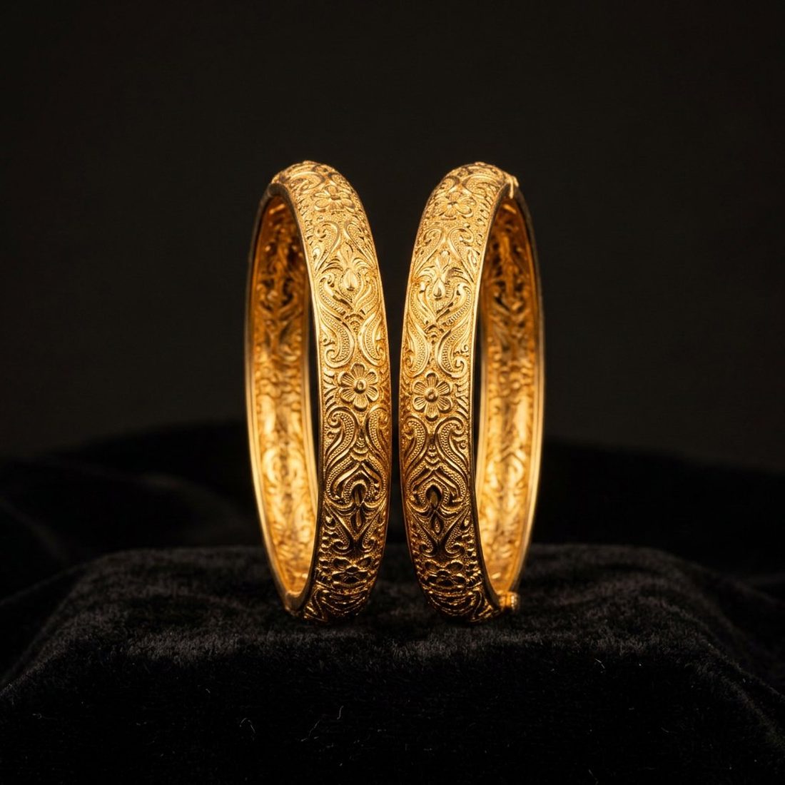 Pair of hand-engraved 22K gold bangles
